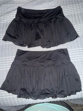 2 black gold hinge skirts